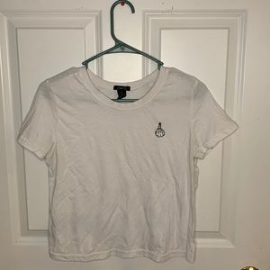 A cropped t-shirt, kinda see through